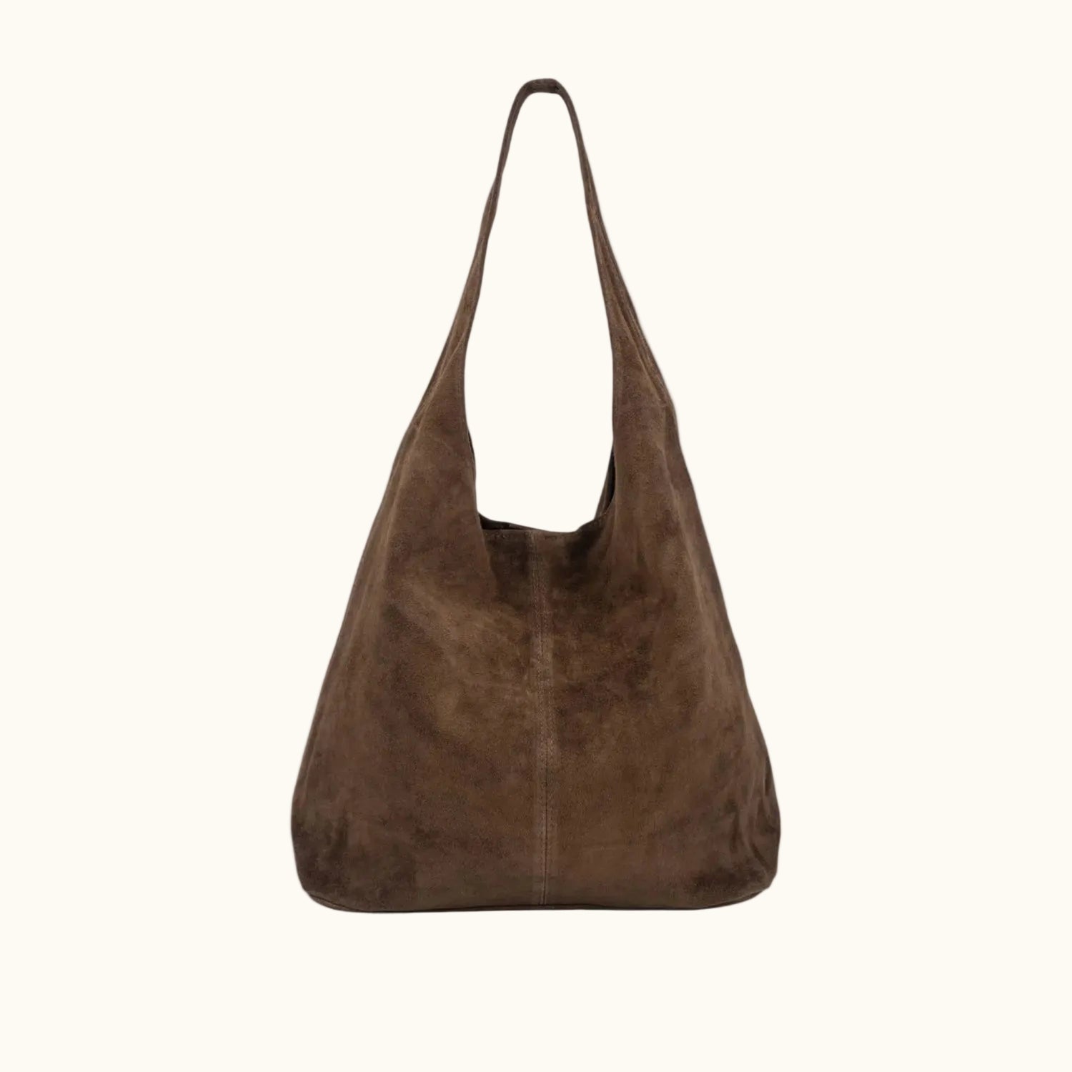 Brown suede handbag on a white background