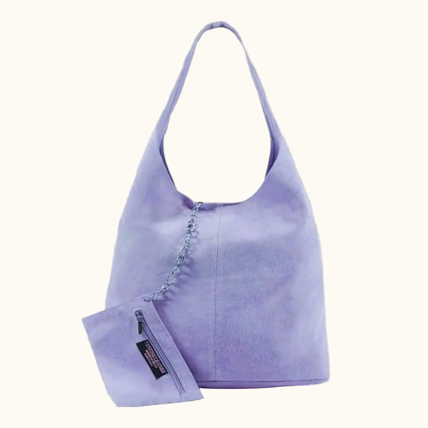 Purple handbag with a matching pouch on a white background
