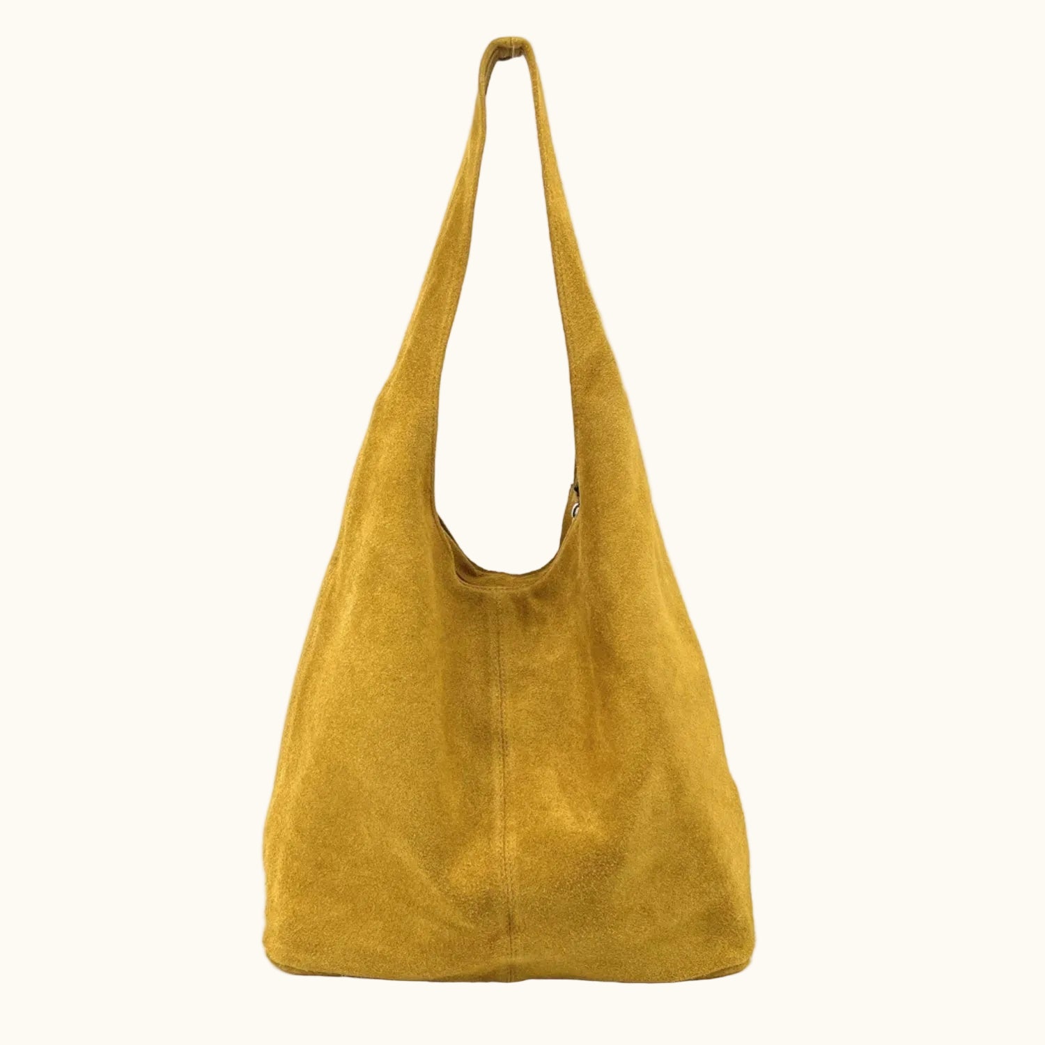 Yellow suede handbag on a white background