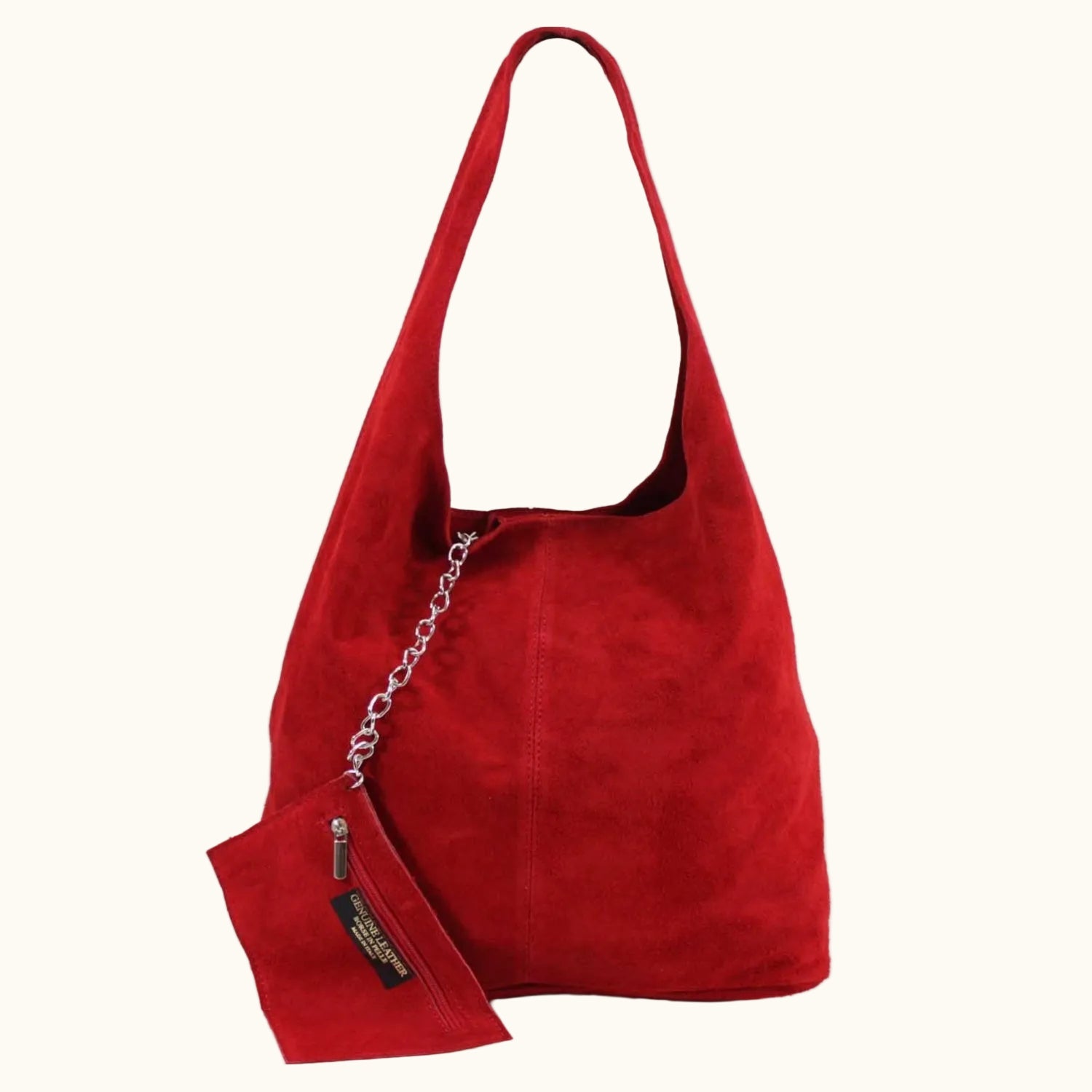Red handbag with a chain detail on a white background