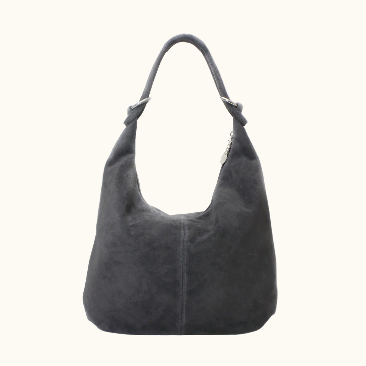 Gray suede handbag on a white background