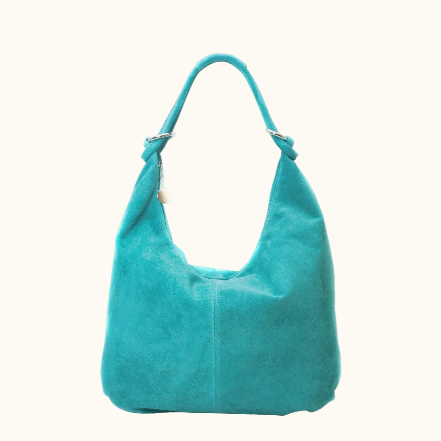 Turquoise handbag on a white background
