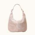 Beige handbag on a white background