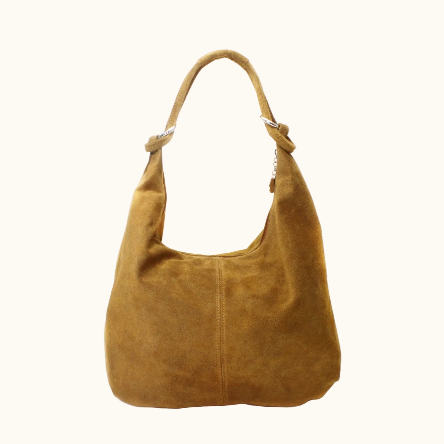 Brown suede handbag on a white background
