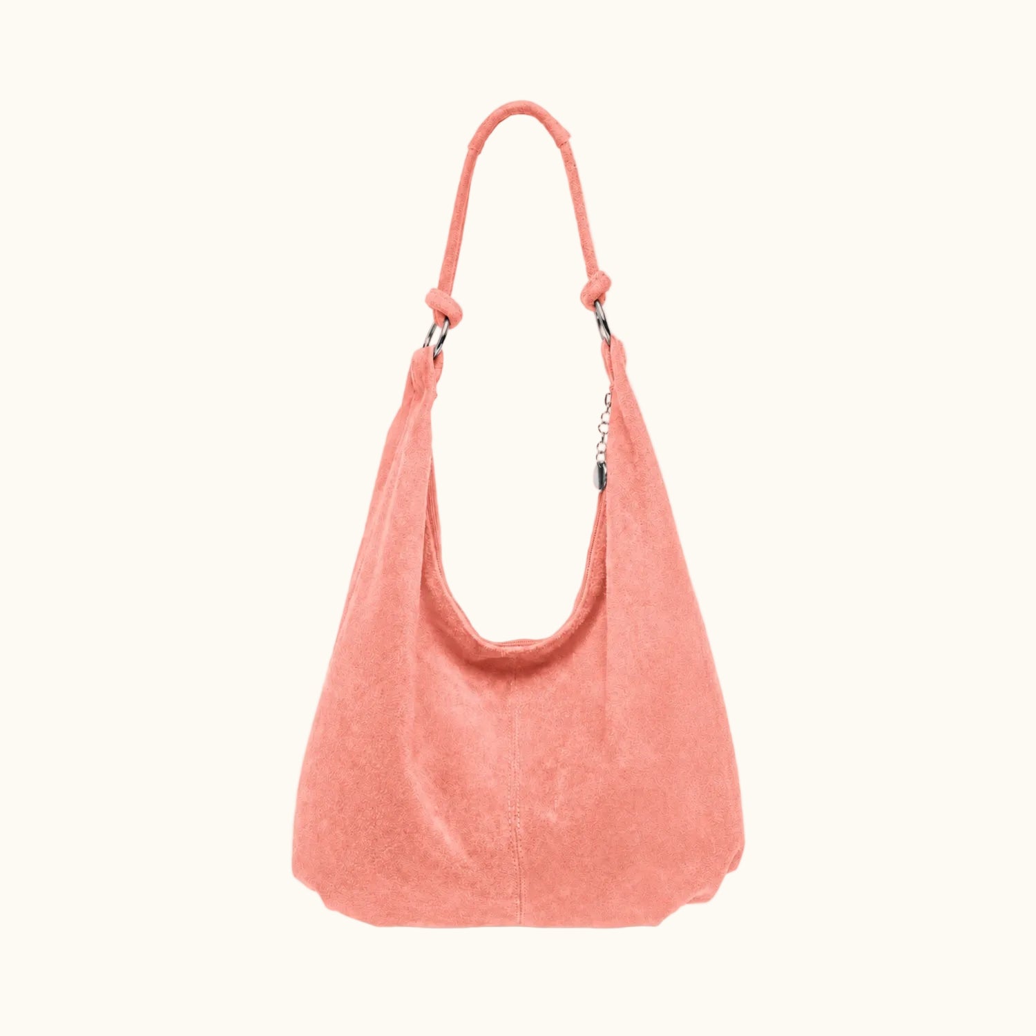 Coral handbag on a light gray background