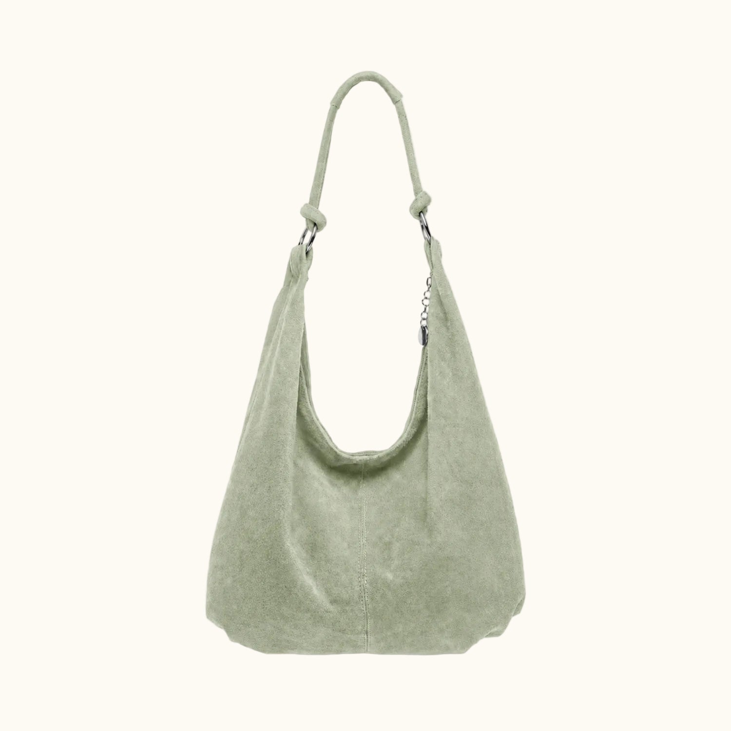 Green handbag on a white background