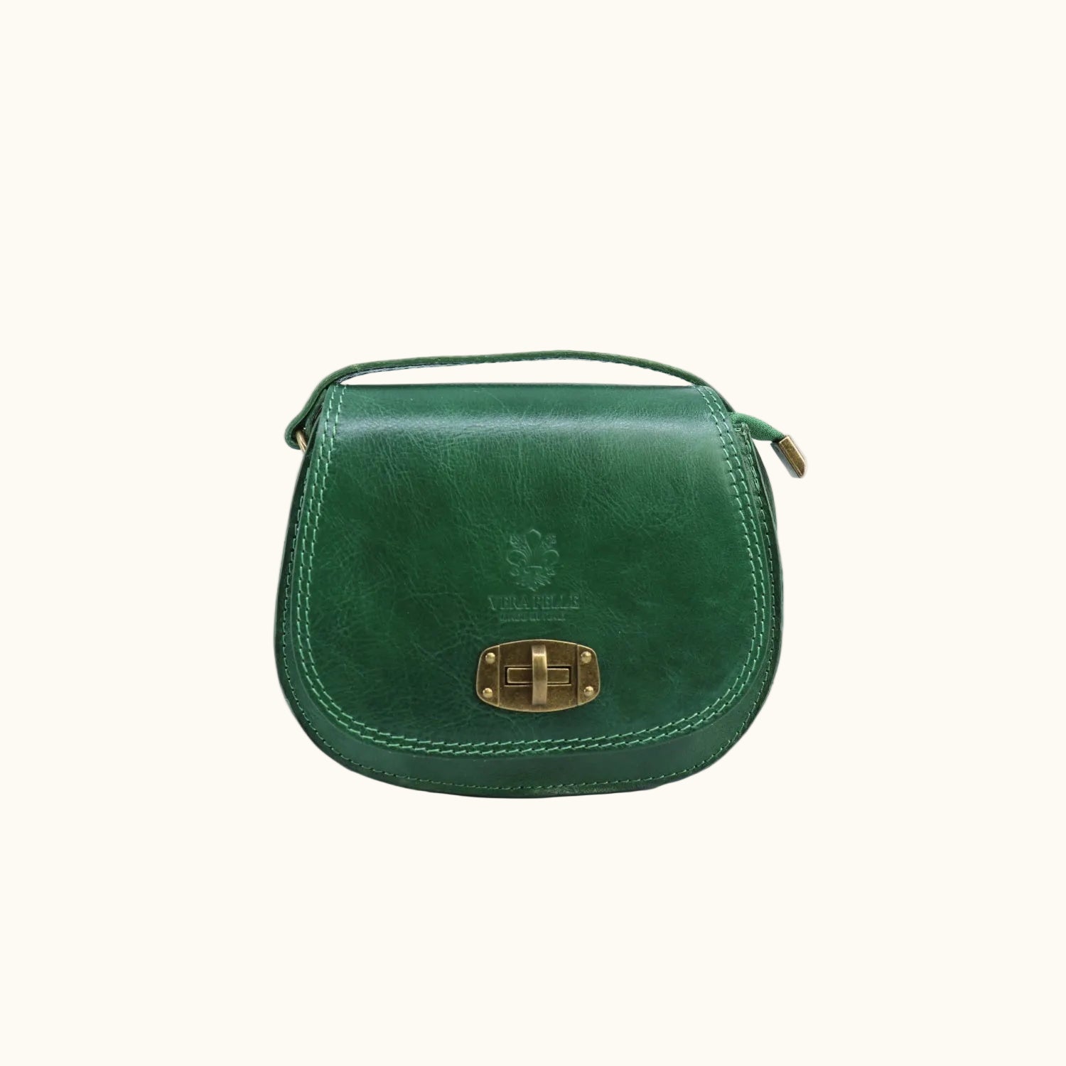 Green leather handbag with a gold clasp on a white background