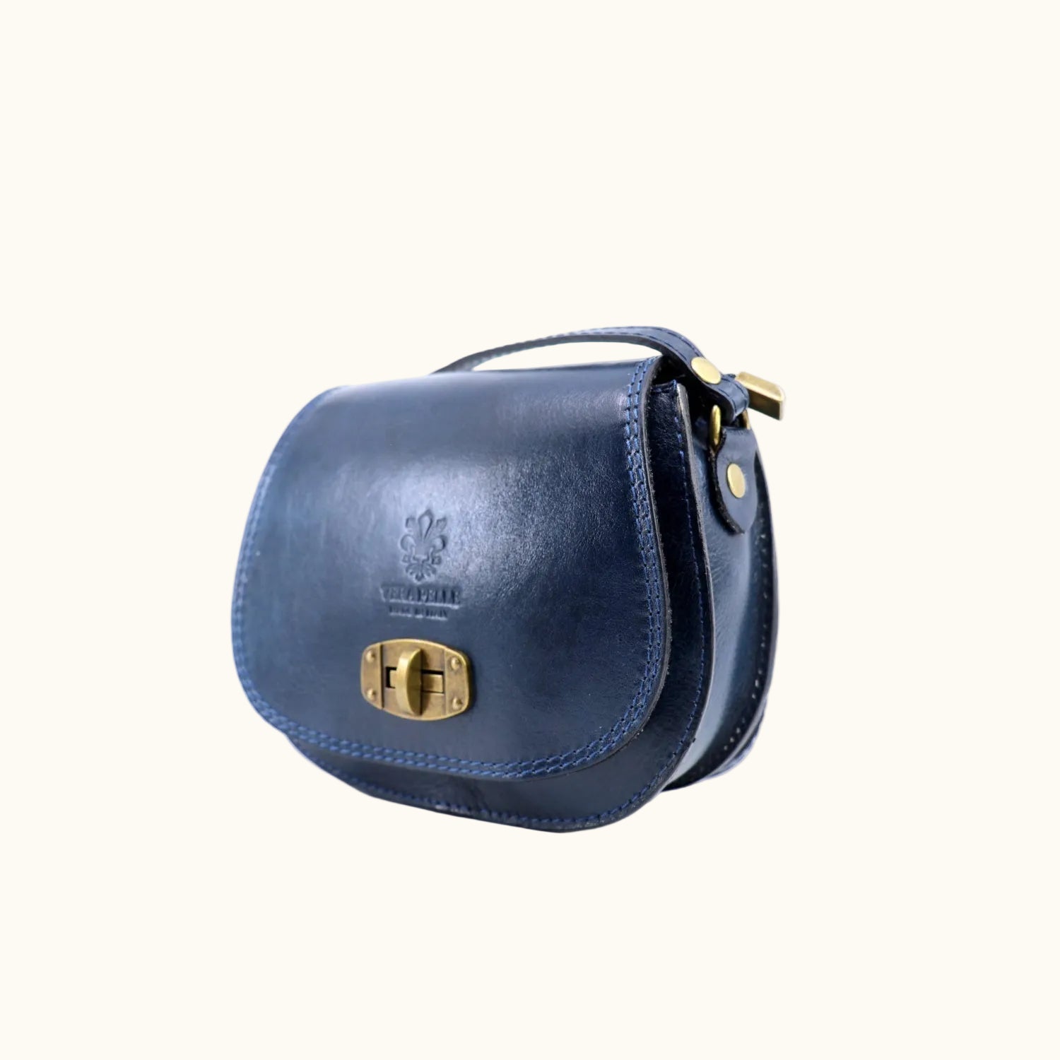 Navy blue leather handbag with gold lock on a white background