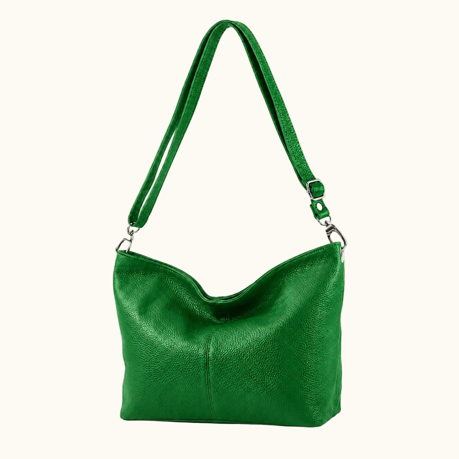 Green handbag with a strap on a white background