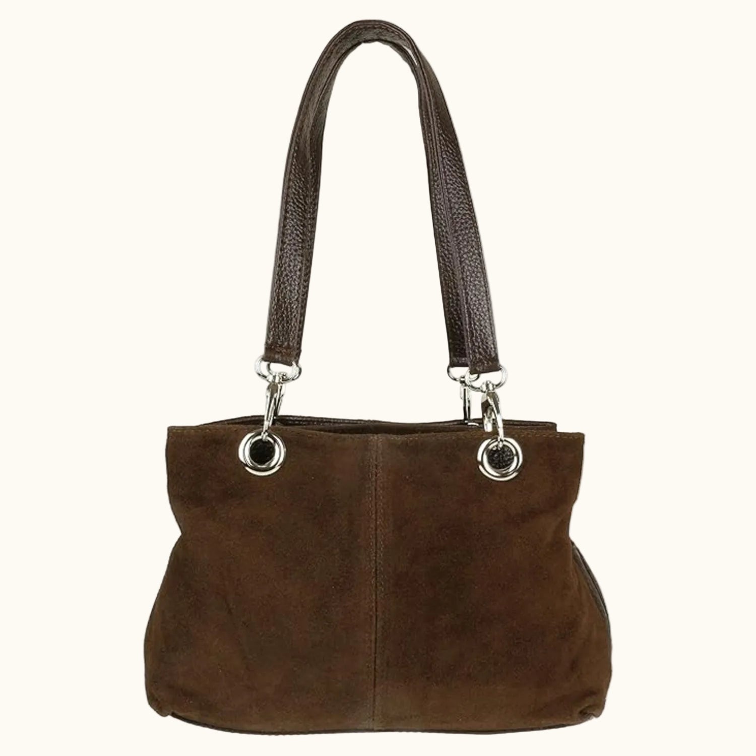 Brown suede handbag with silver hardware on a white background