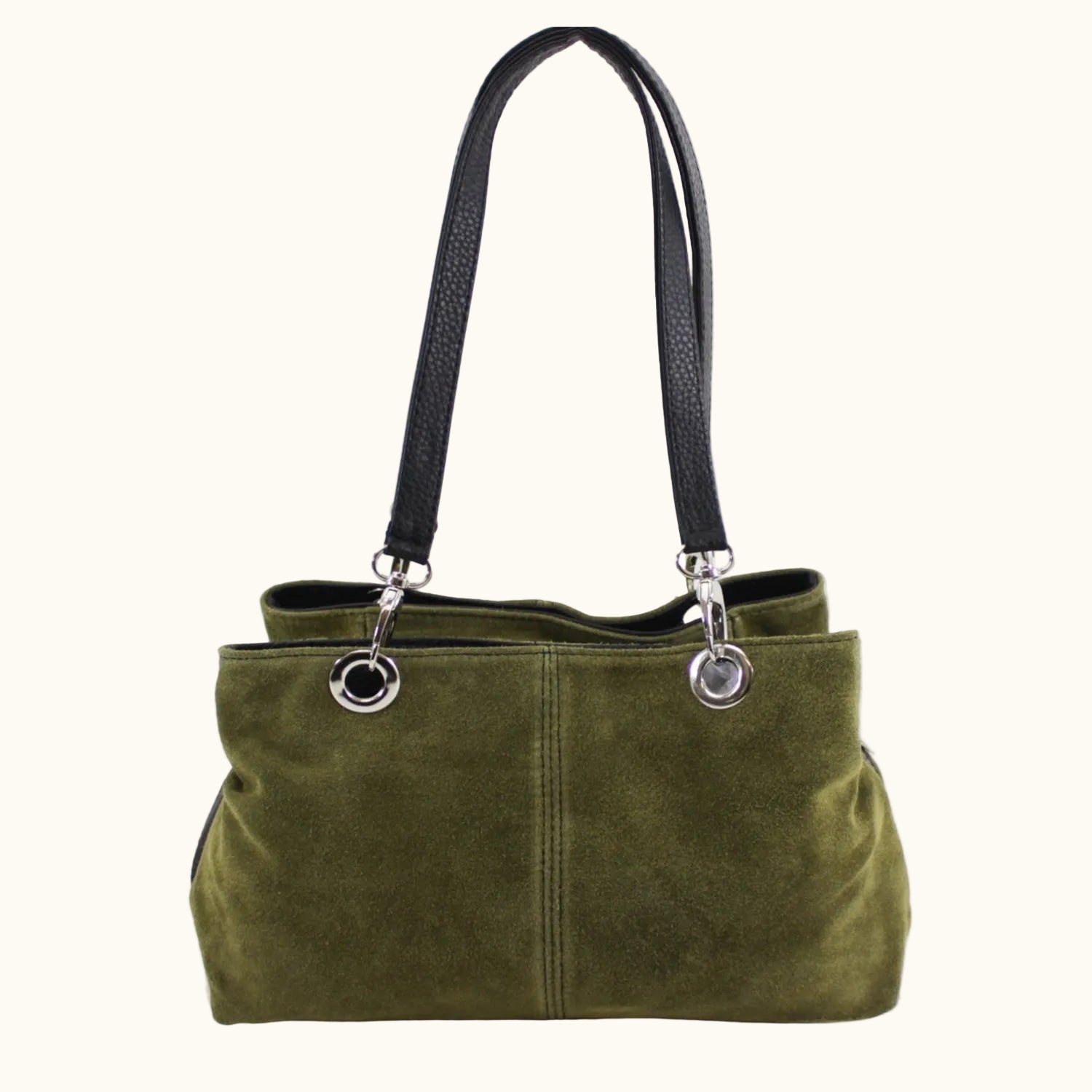 Green handbag with black handle on a white background