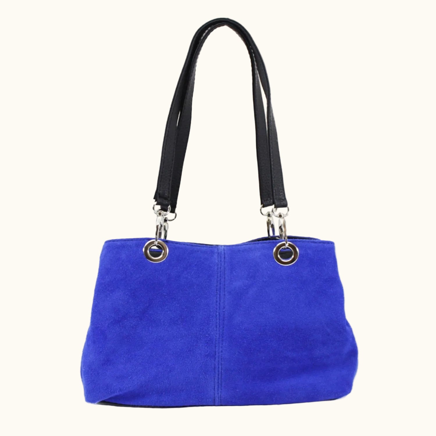 Blue handbag with black handles on a white background