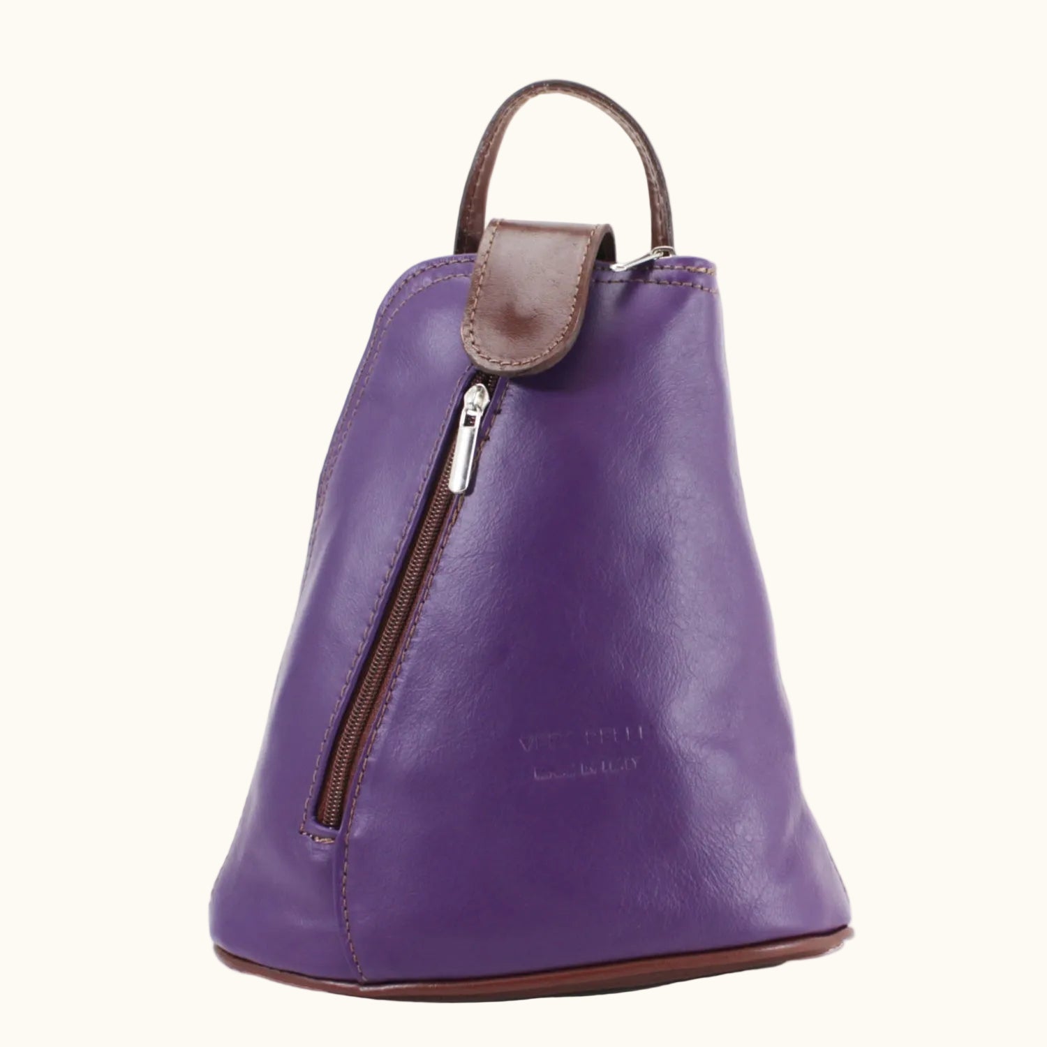 Purple leather backpack with brown accents on a white background