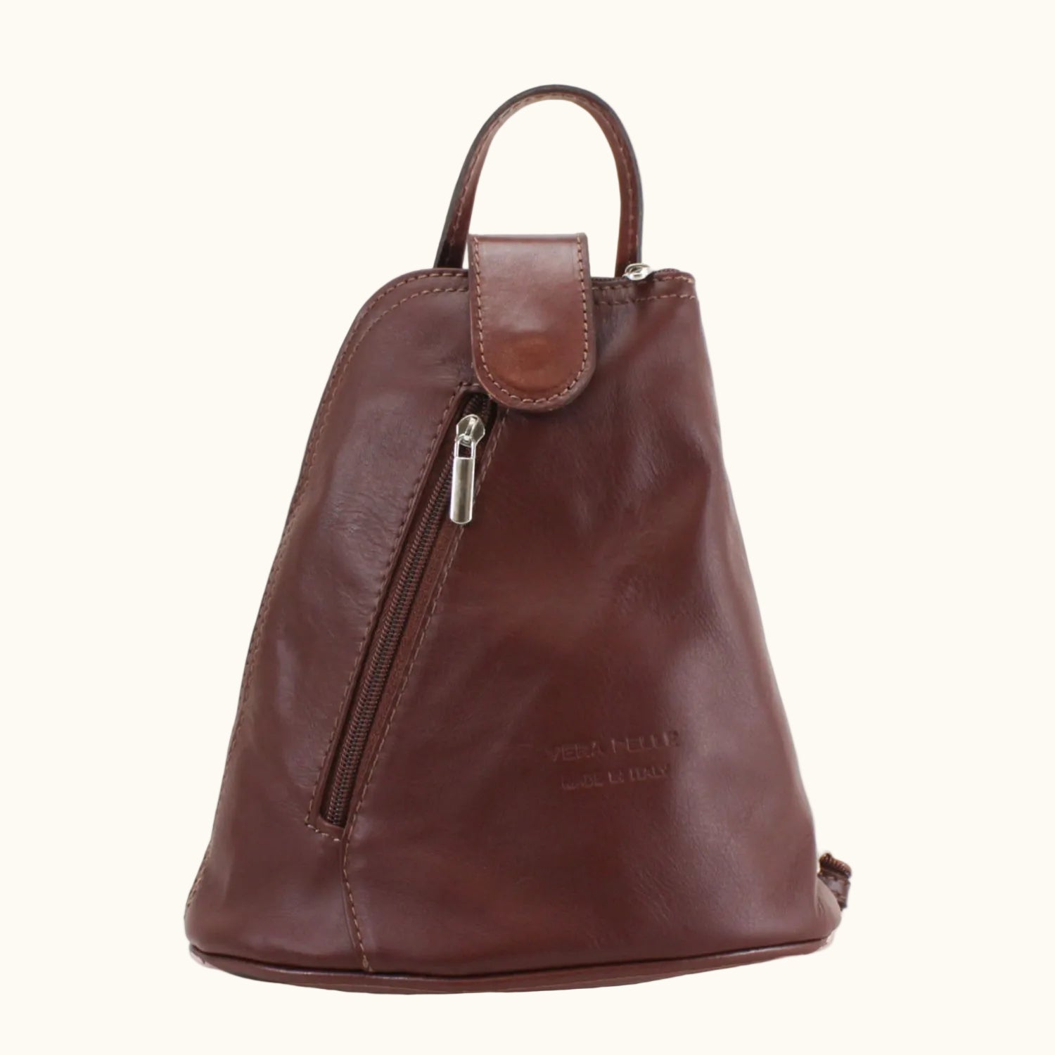 Brown leather backpack on a white background
