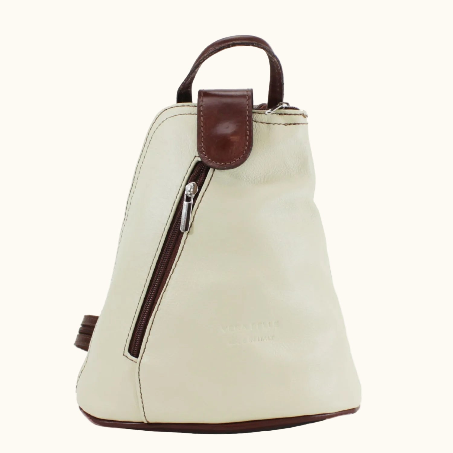 Beige backpack with brown accents on a white background