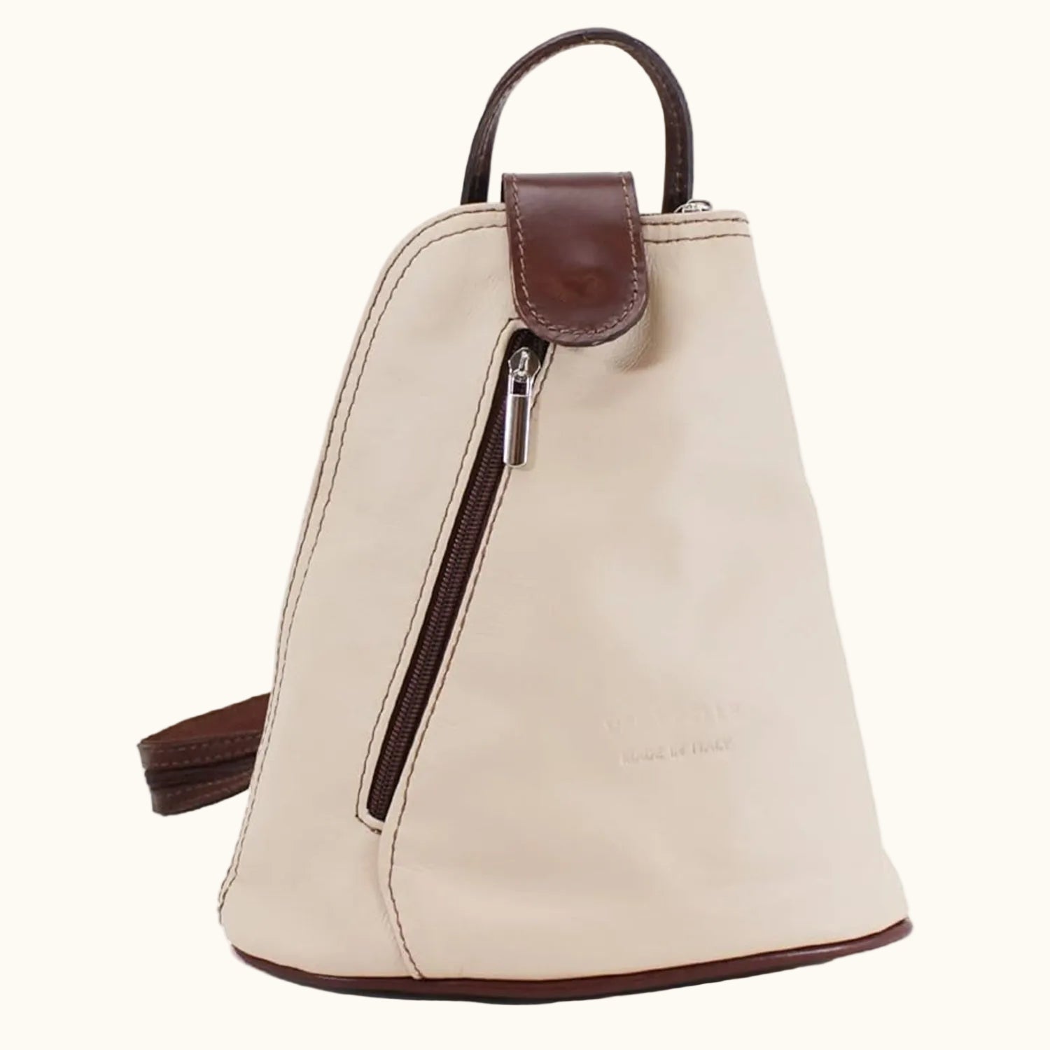 Beige backpack with brown accents on a white background