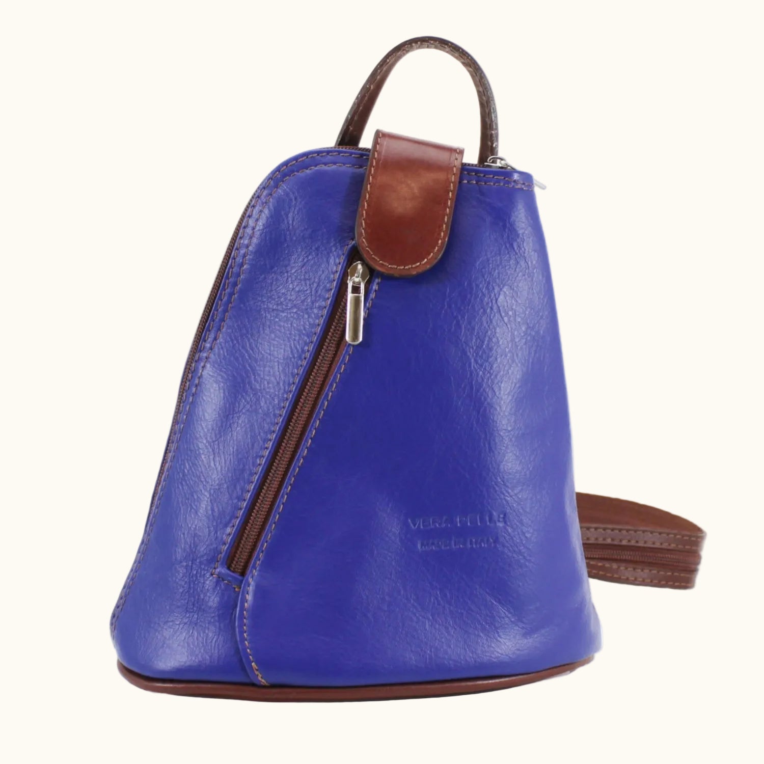 Blue leather backpack with brown accents on a white background