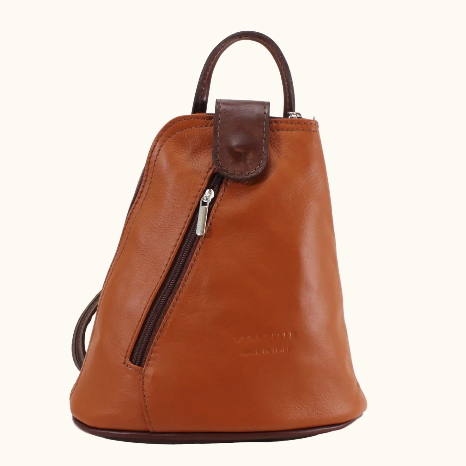 Brown leather backpack with a visible brand name on a white background