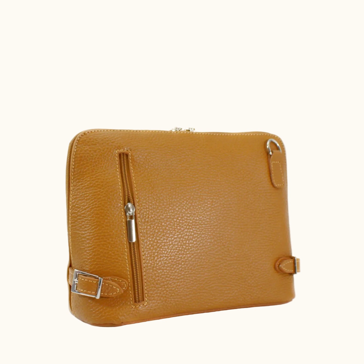 Brown leather bag with gold zipper and buckle on a white background