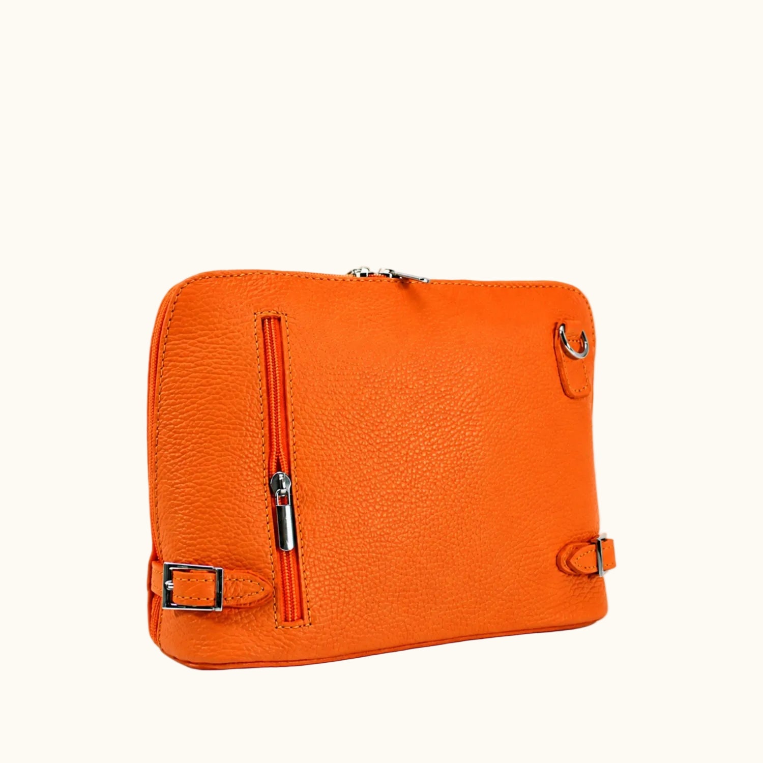 Orange leather bag with silver zippers and hardware on a white background