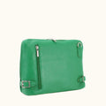 Green leather bag with silver zippers and buckles on a white background
