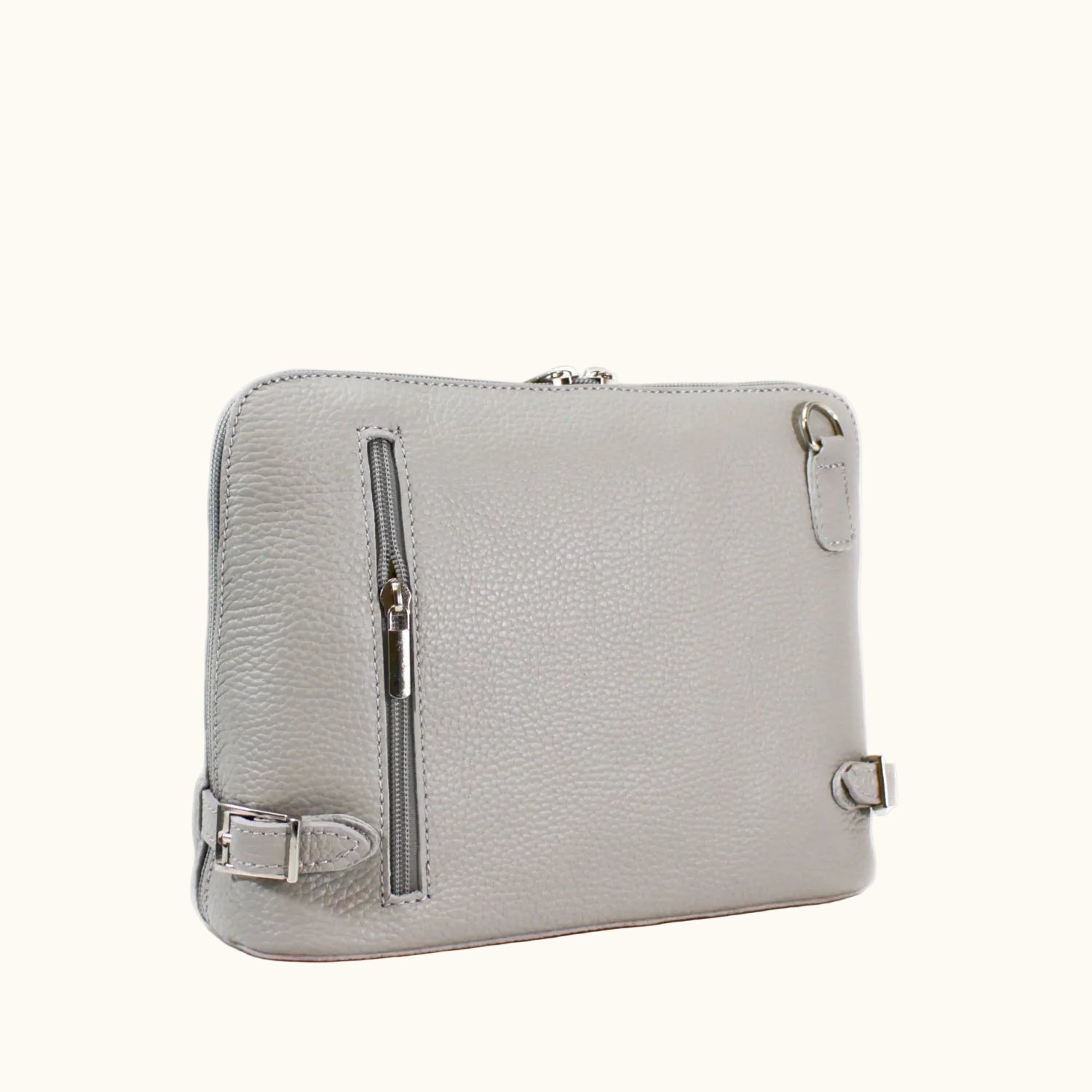 Light gray leather clutch bag with silver zippers on a white background