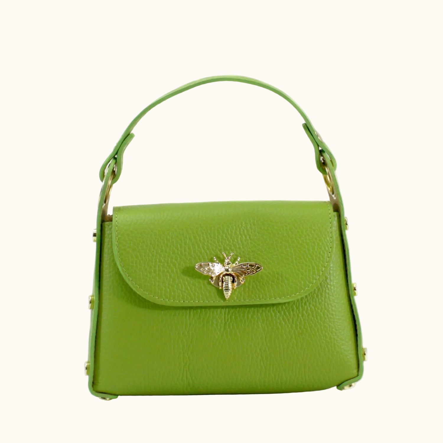Green handbag with a bee emblem on a white background