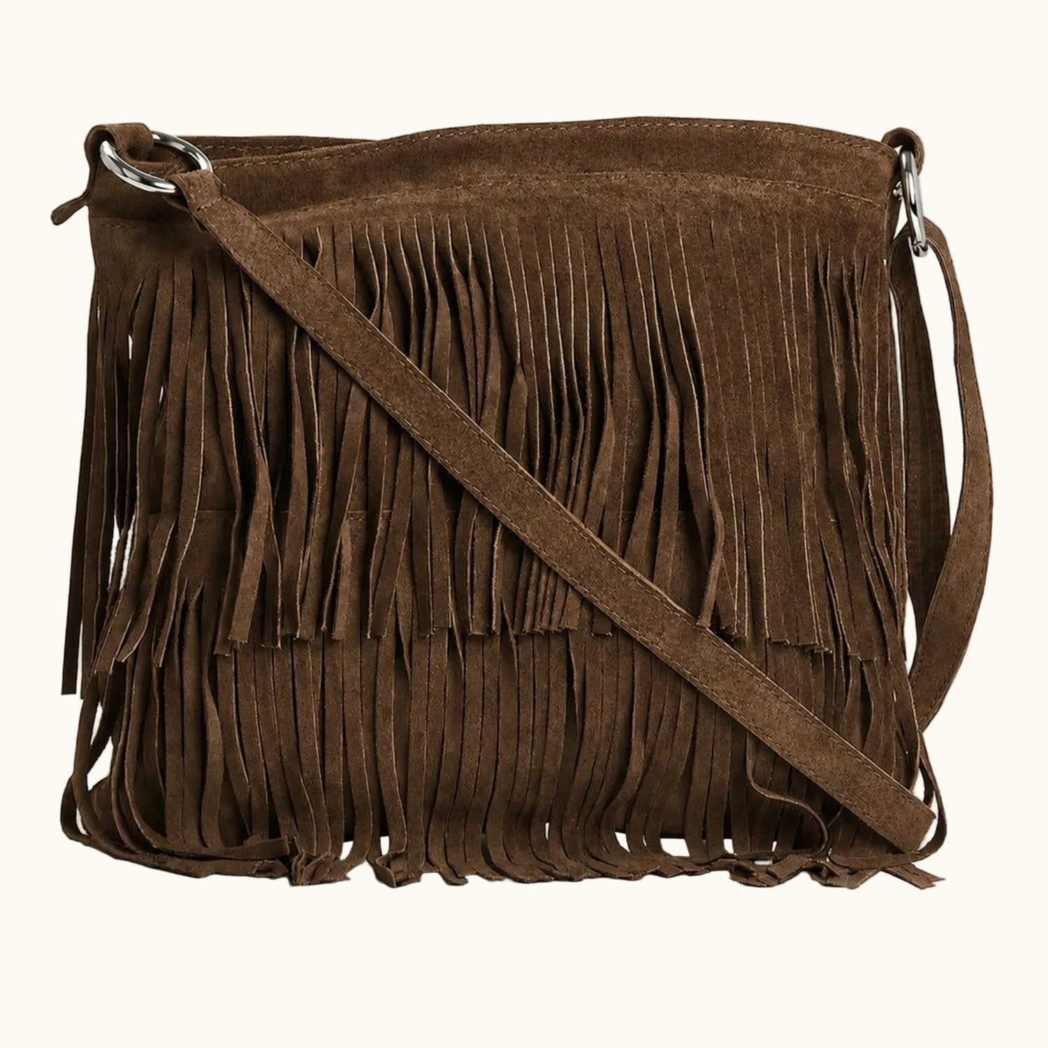 Brown suede handbag with fringe details on a white background