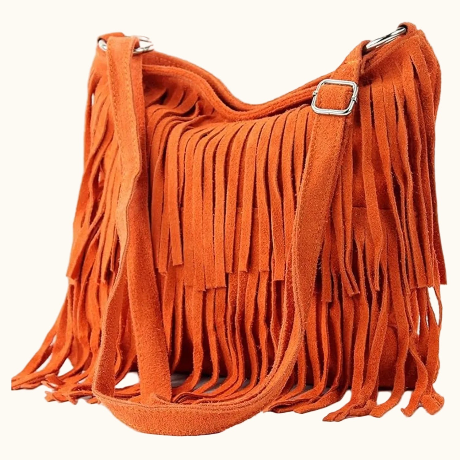 Orange suede handbag with fringes on a white background