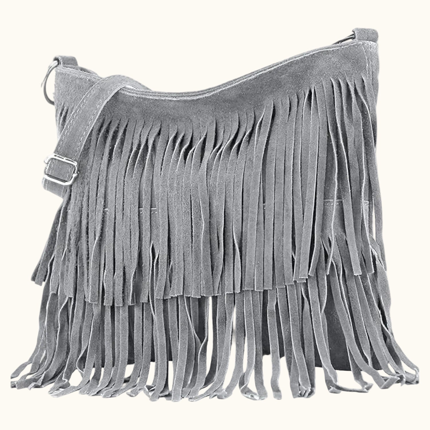 Gray suede handbag with fringe details on a white background