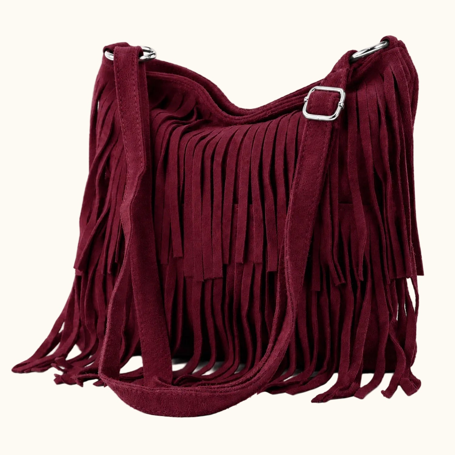 Maroon fringed handbag on a white background