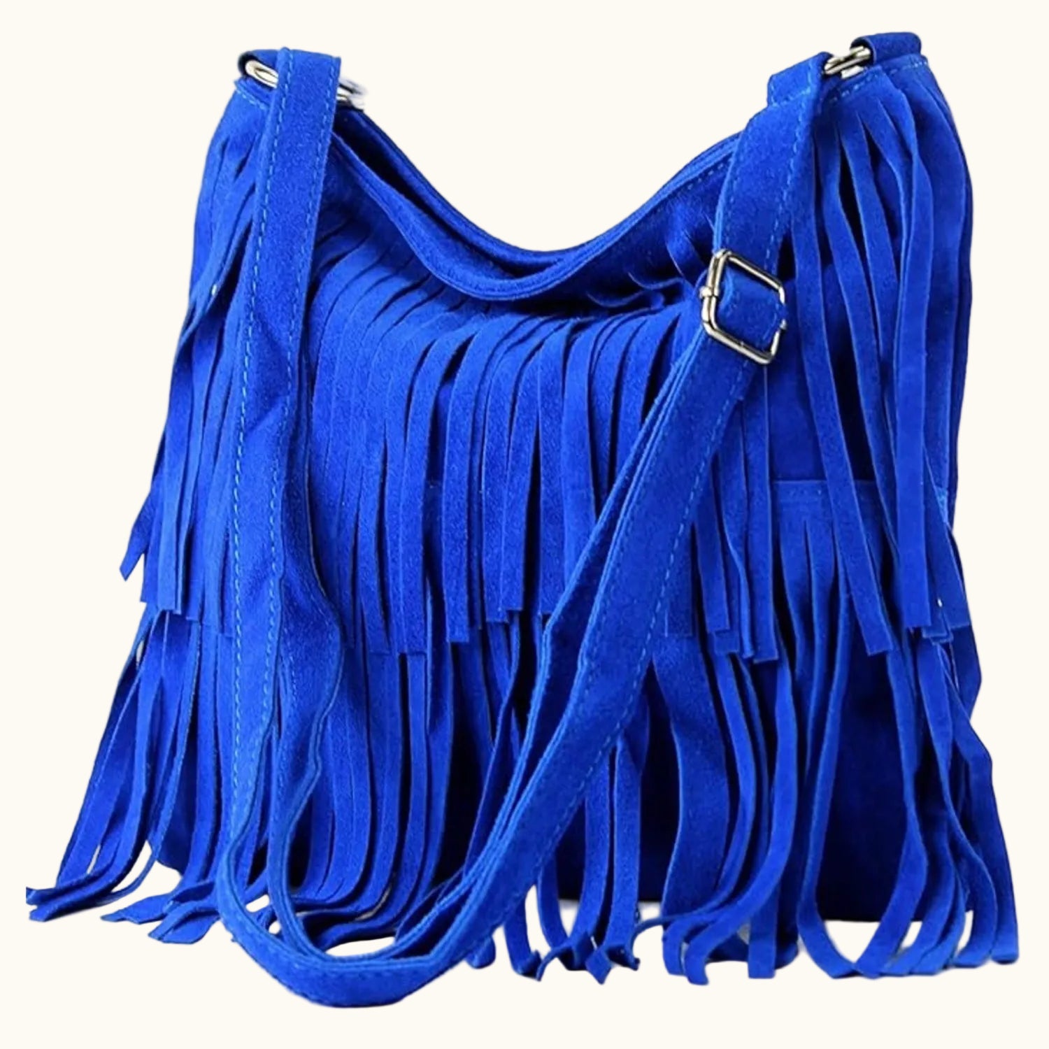 Blue suede handbag with fringe details on a white background