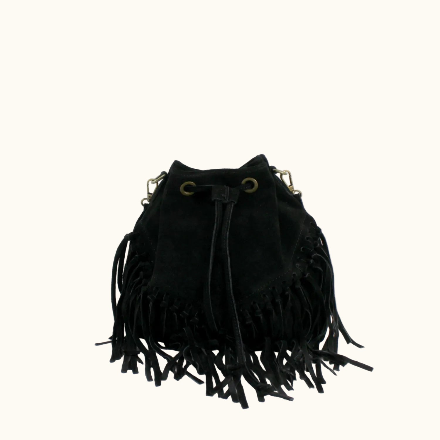 Black suede handbag with fringe details on a white background