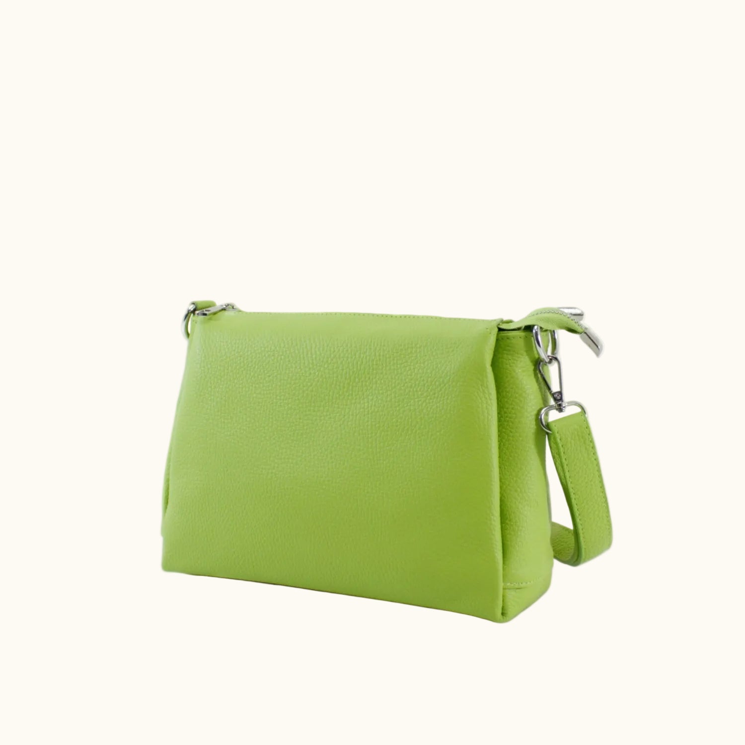 Green handbag on a white background