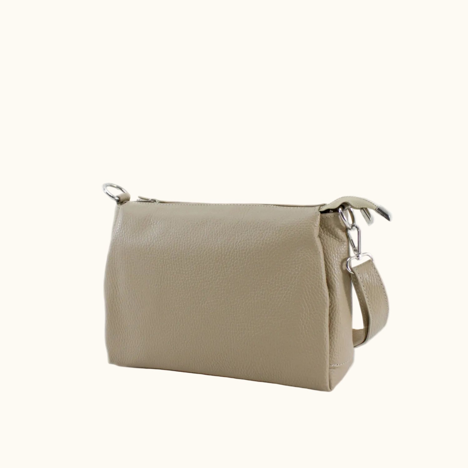 Beige handbag with a strap on a white background