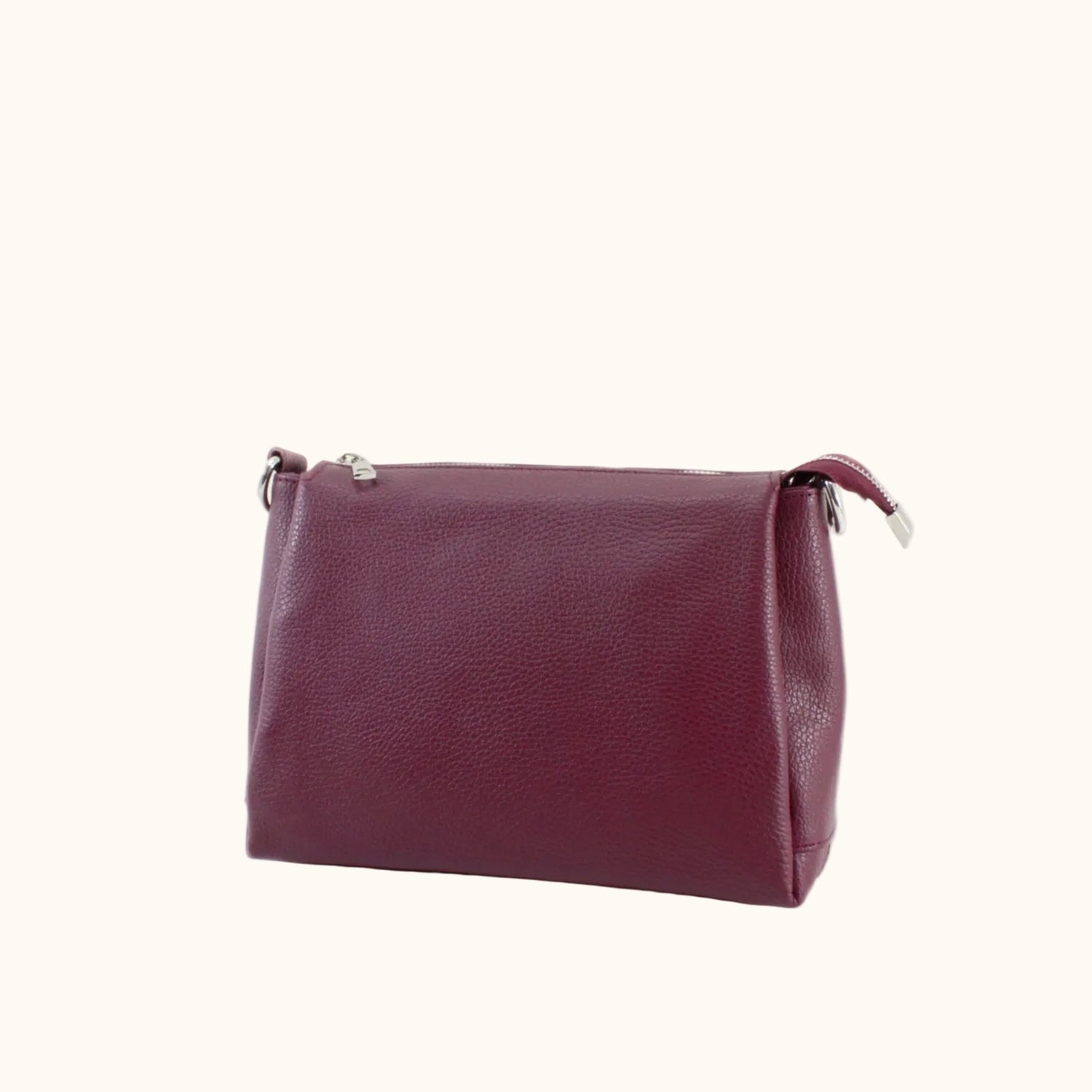 Maroon leather bag on a white background