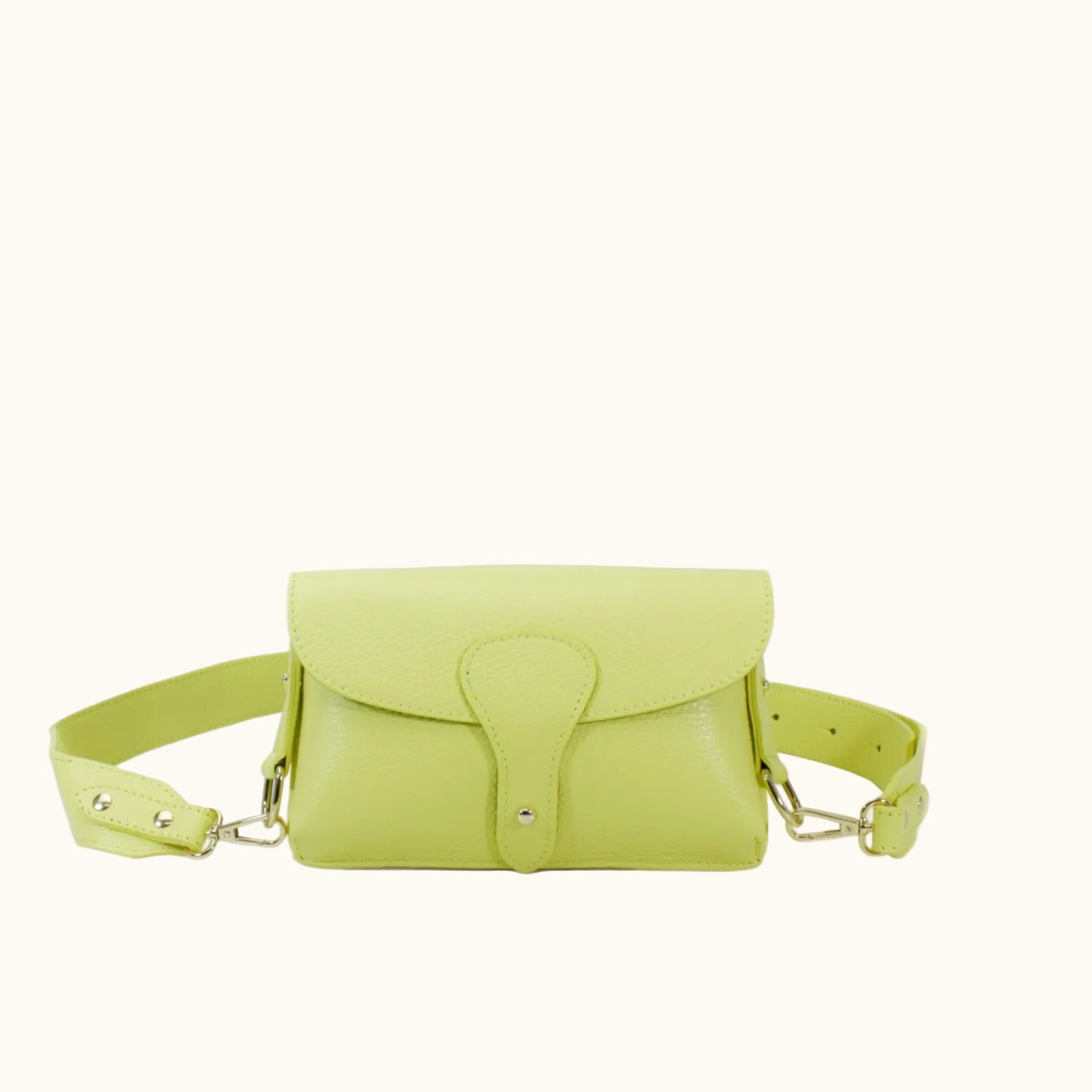 Light green leather waist bag on a white background
