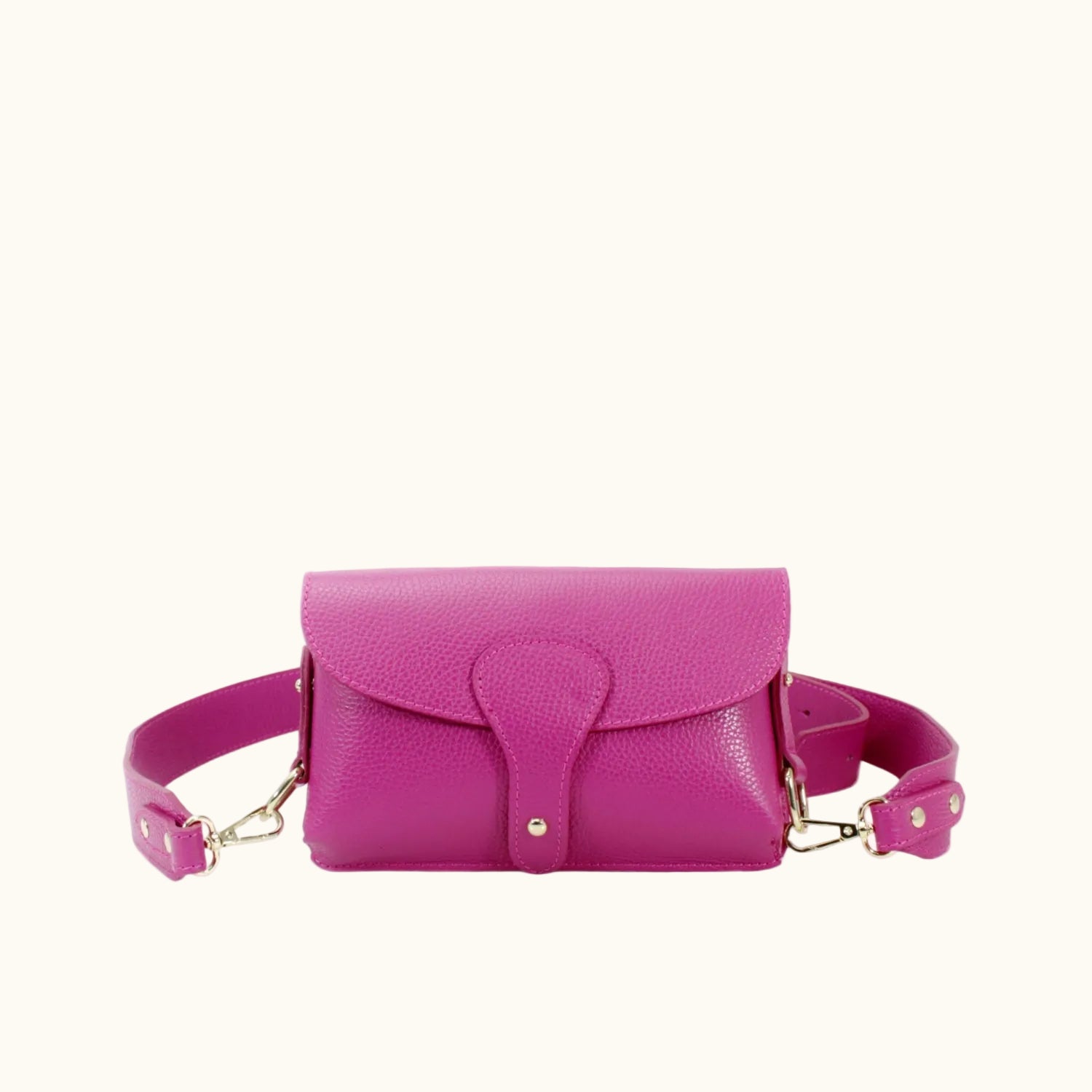 Pink handbag with gold accents on a white background