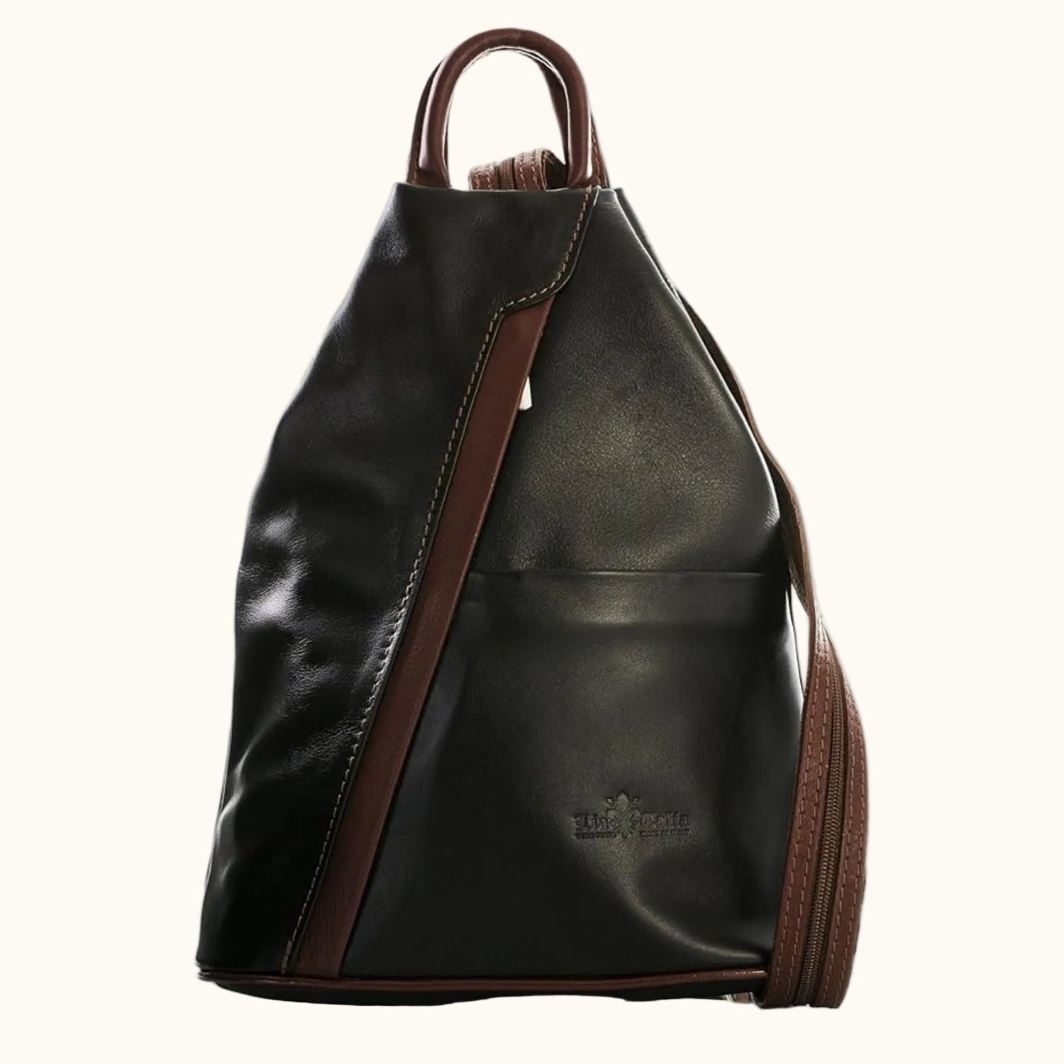 Black leather backpack with brown accents on a white background