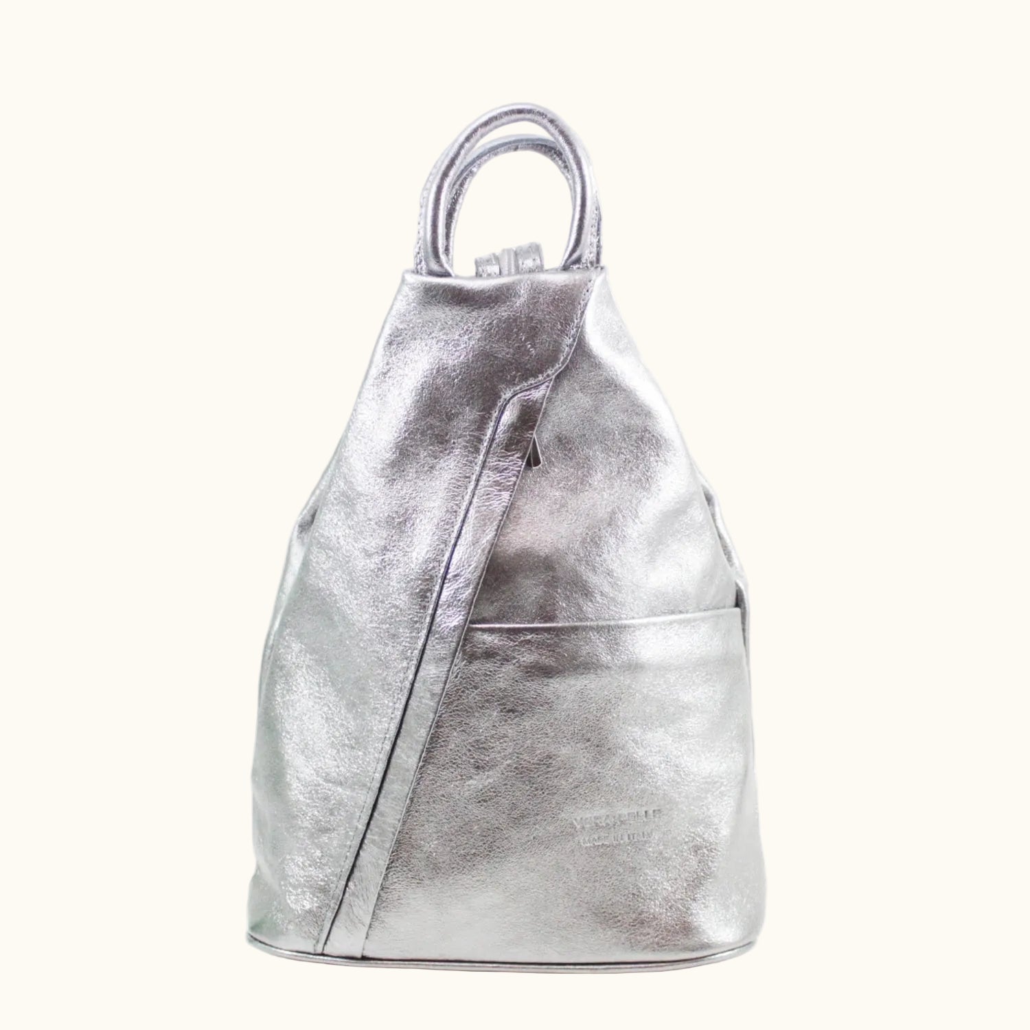 Silver metallic backpack on a white background