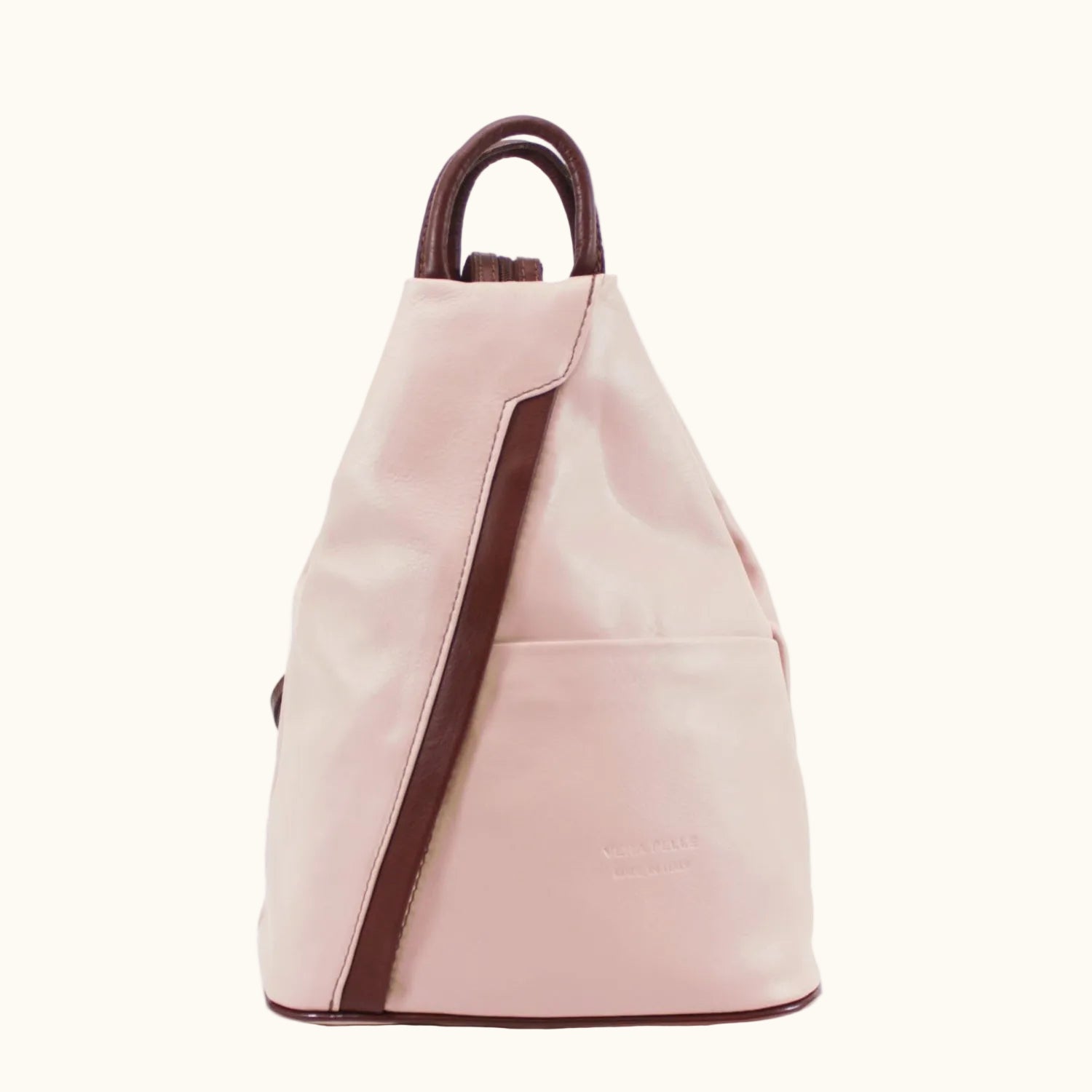 Pink backpack with brown accents on a white background