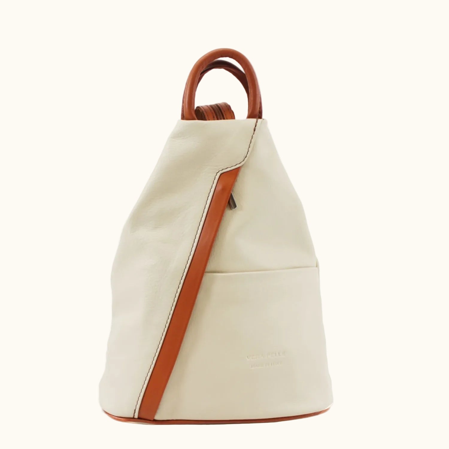 Beige backpack with brown leather accents on a white background