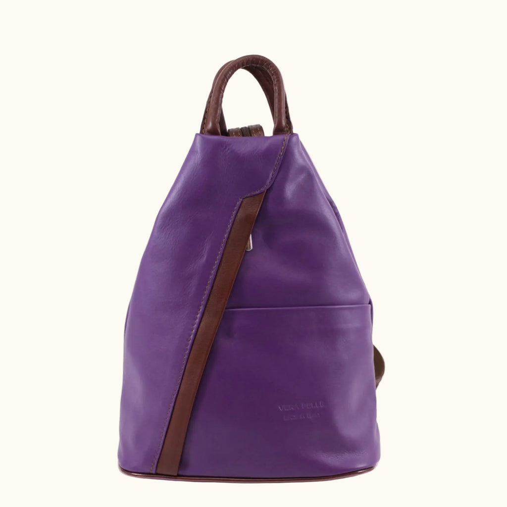 Purple backpack with brown straps on a white background