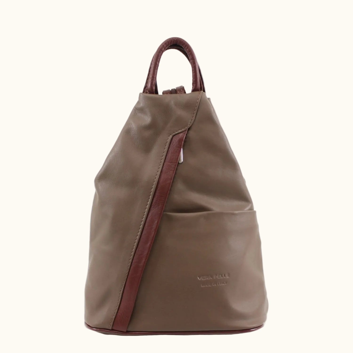 Brown backpack with leather straps on a white background