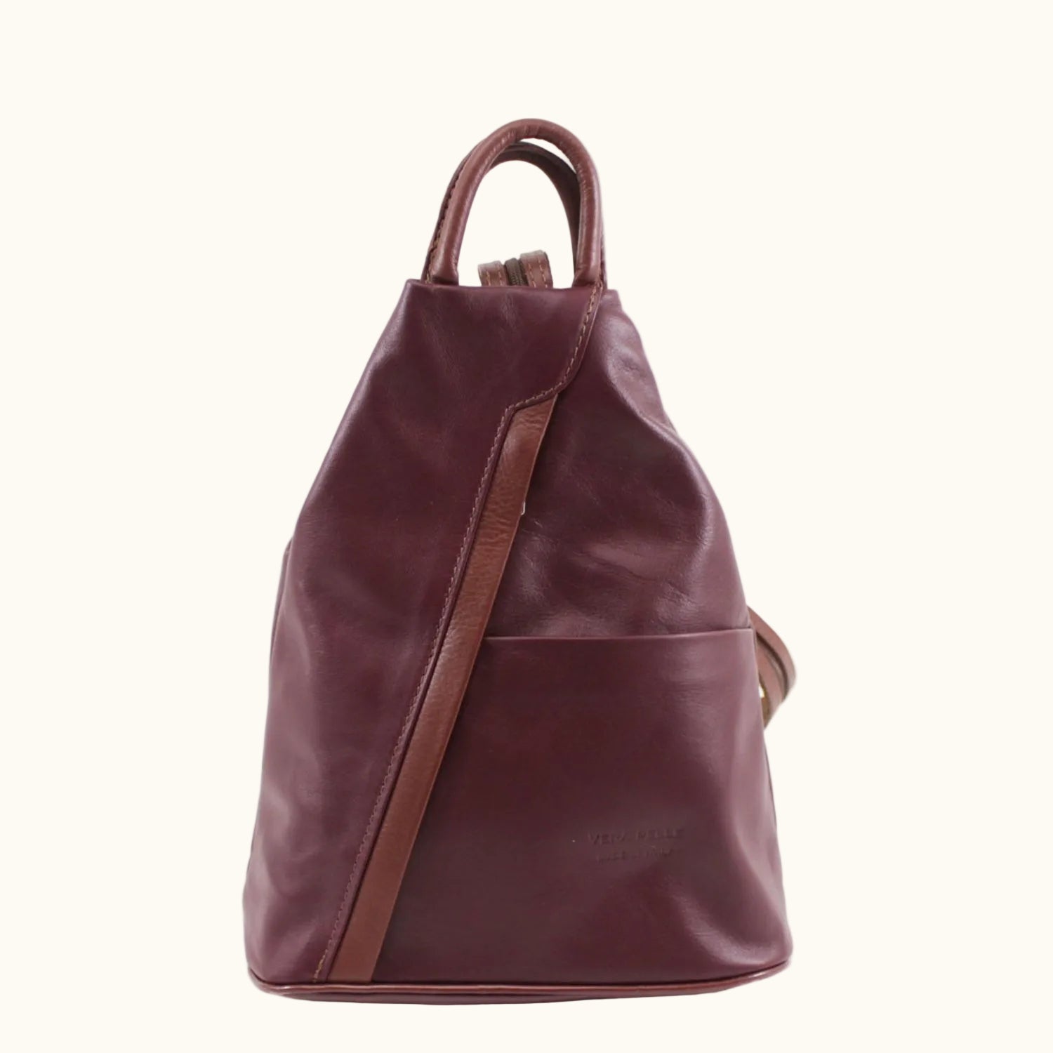 Brown leather backpack on a white background