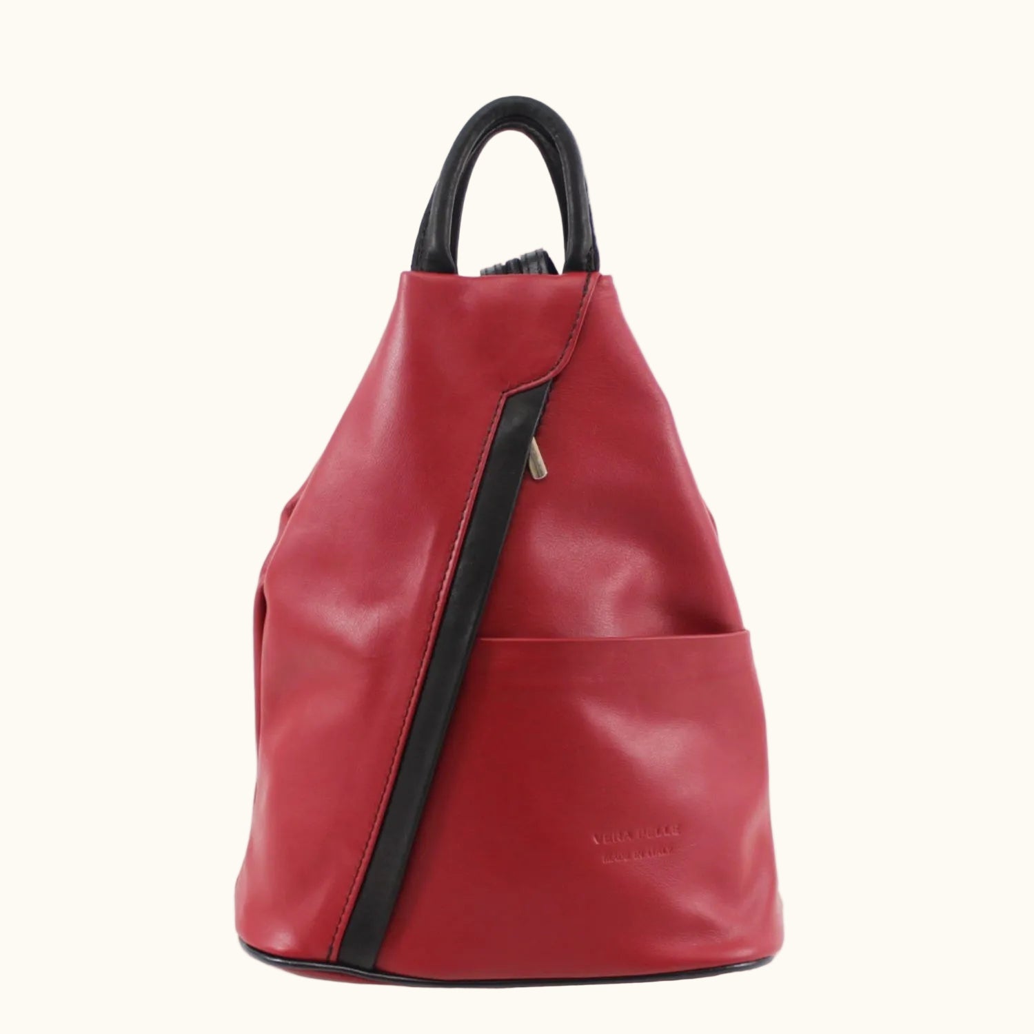Red leather backpack with black accents on a white background