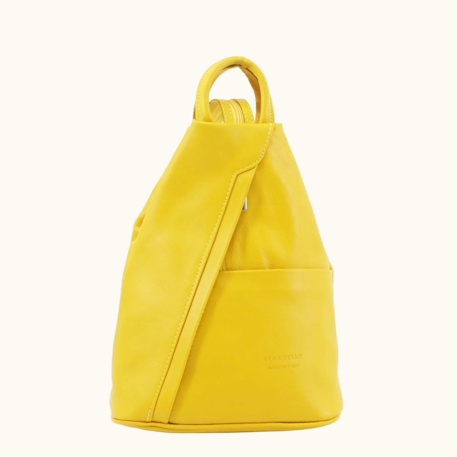 Yellow backpack on a white background