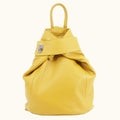Yellow leather backpack with a knot design on a white background