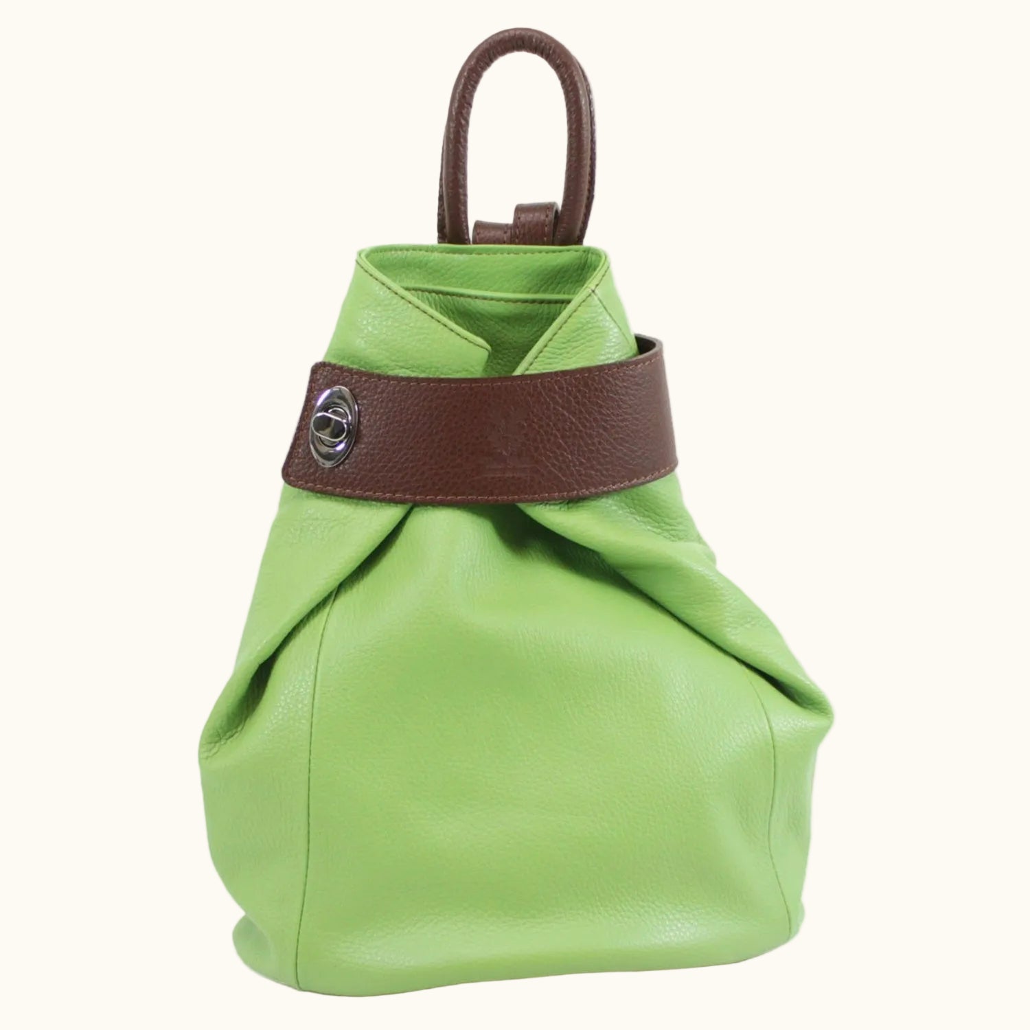 Green bag with brown strap on a white background