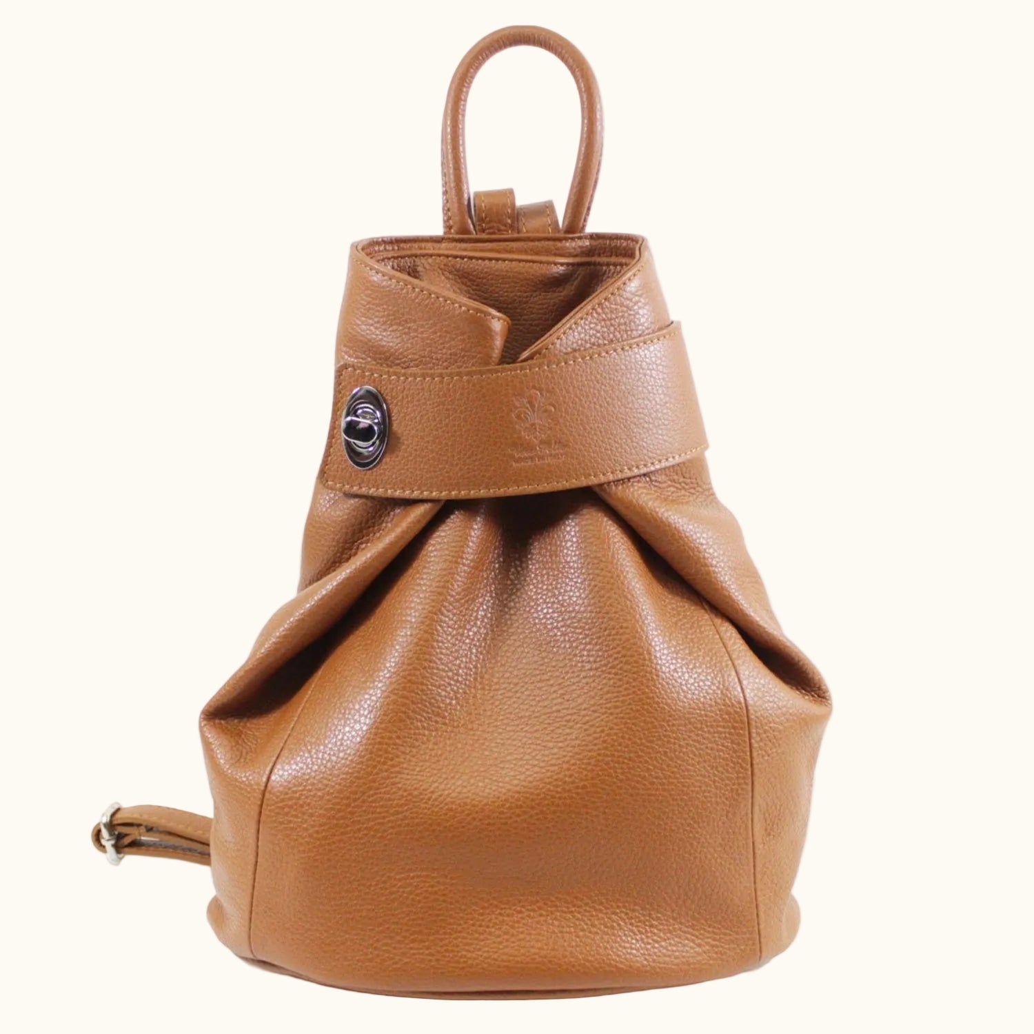 Brown leather backpack on a white background